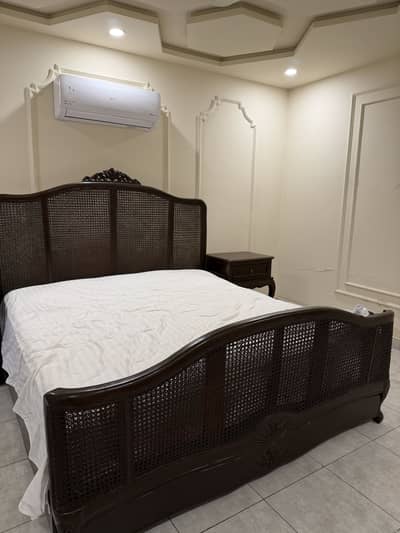 Wooden cane bed king sized