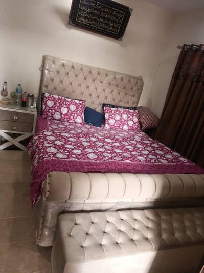 Bed with side tables and dressing