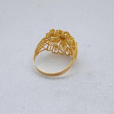 24 karrot original gold ring weight 4.8 grams.