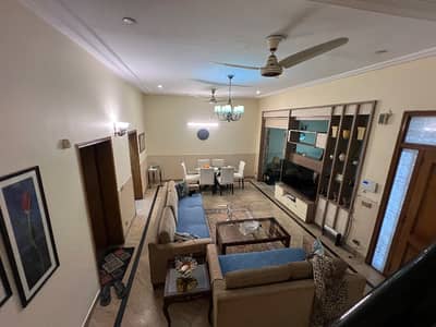 5 Marla house for sale in Johar town block A2 Facing park (original photo) Tile flooring Hot location Main apporched
