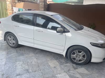 City 2018 model ( White Color, Islamabad registered)