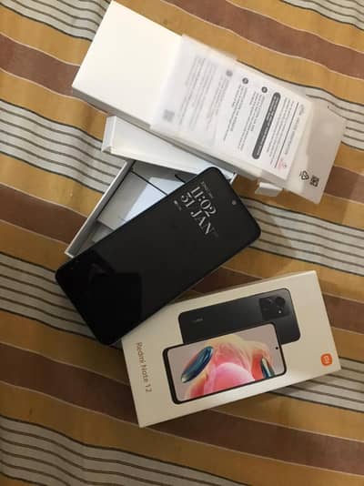 Redmi note 12 8Gp ram /128 memory Ice blue coolur 10 by condition