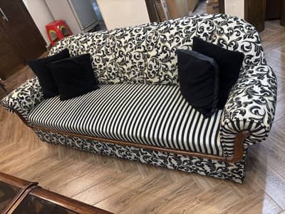 Three seater sofa with table