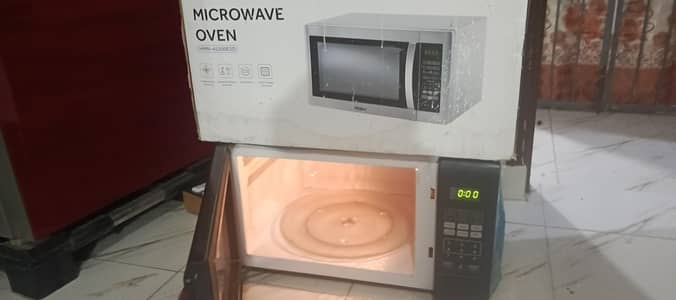 Haier 2 in 1 grill microwave oven  45 liter  With box