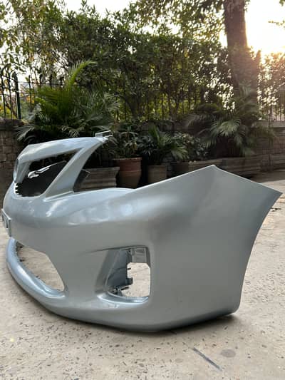 Corolla 2013 orignal bumper with new paint