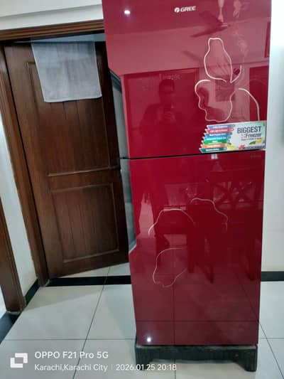 selling fresh and good condition gree large size refrigerator
