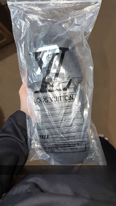 Louis Vuitton slides.