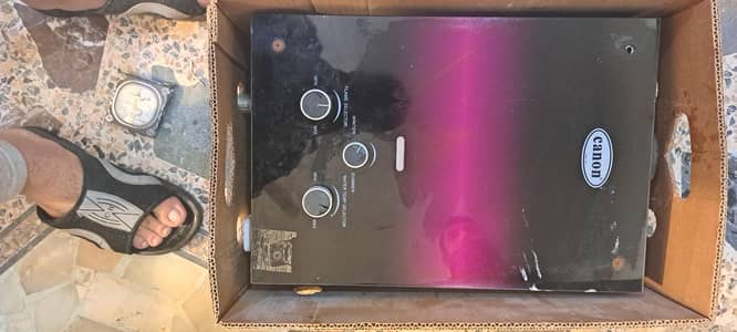 canon instant  geysers  with all assosseries