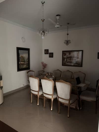 8 seat wooden dining table with glass top