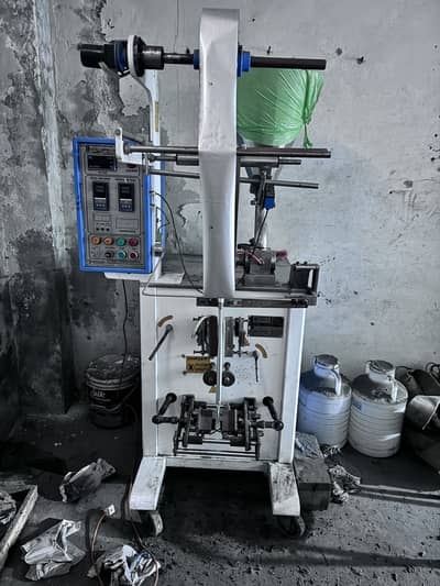 Liquid packing machine , ketchup , shampoo packing machine