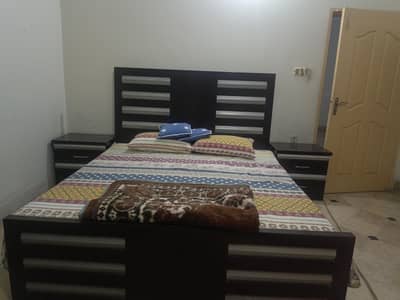 Bed with vanity/dressing table and side tables