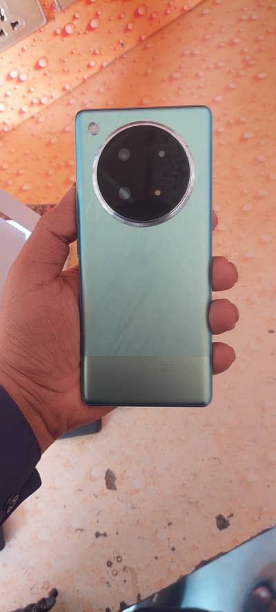 Infinix zero 40 10/10 condition 1 month used.