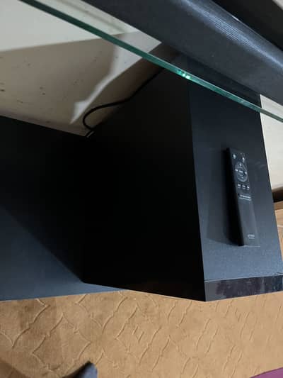 Brand new with original remote wires and box of bar and woofer