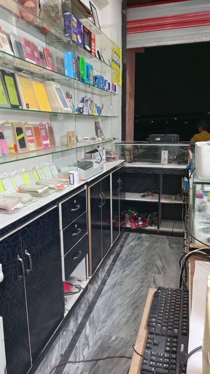 موبائل شاپ کاؤنٹر ز  ریکس اینڈ پرنٹرز 13