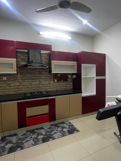 Kitchen for sale [including a stove, sink and a hood]