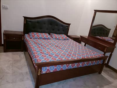 Bed with side table with dressing and with mattress