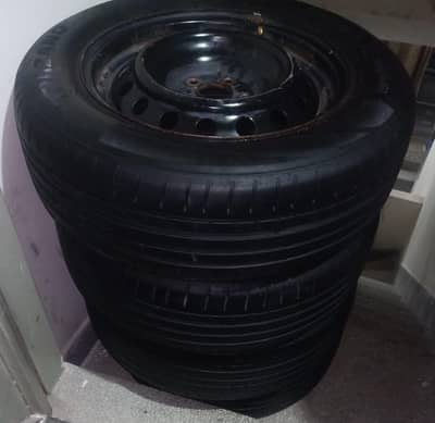 Toyota 4 Adad Corolla GLI and XLI k 100%  genuine Rim and Tire