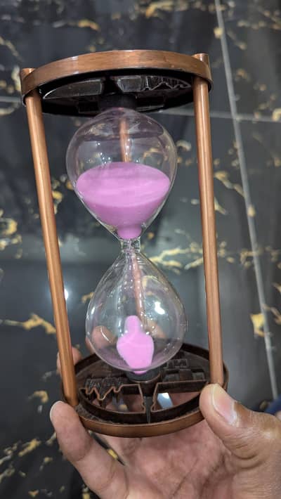 Sand clock hour glass available