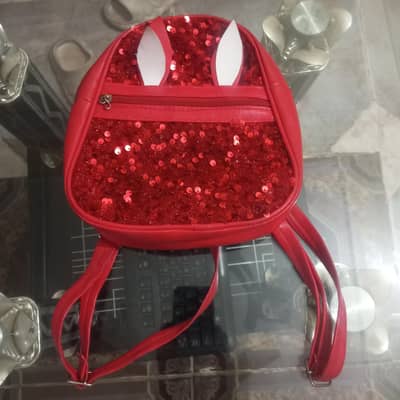 girls red bag