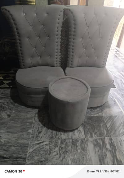 2 bed room chairs with table