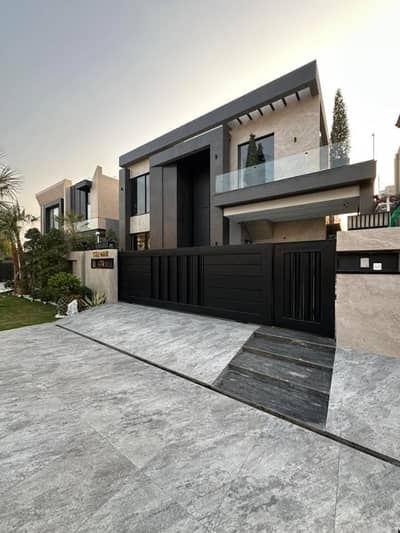 BRAND NEW 1-KANAL ELEGANT AND SUPER HOT LOCATED BUNGALOW WITH BASEMENT IS AVAILABLE IN THE BEST BLOCK OF DHA LAHORE.