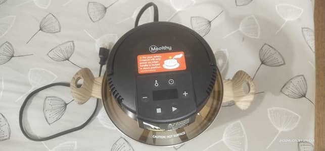 Mealthy crisplid air fryer and cooker