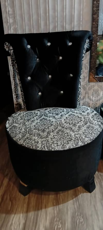 Two room chairs with coffee table