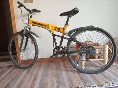 HUMMER IMPORTED  FOLDING CYCLE GOOD CONDITION