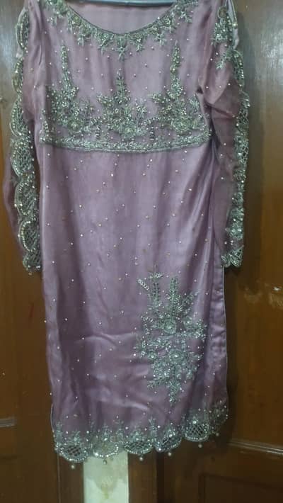 beautiful handmade embroidery with stone work