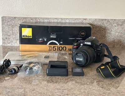 Nikon D5100 + 18-55mm Lens Brand New only used 1 time in family Weding
