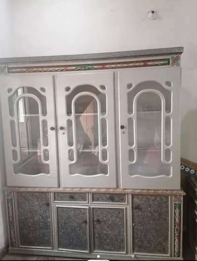 wooden showcase with drawers