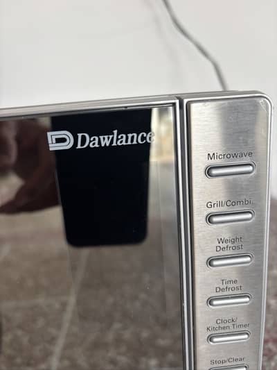 Dawlance DW-393 GSS.  condition 9.999/10, used for 3 or 4 times only.