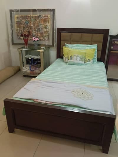 single bed with poshish back