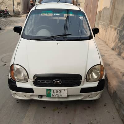 santro,2006,white,power,sataring,