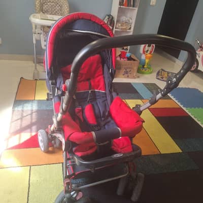 baby stroller . foldable  bright starts۔good condition