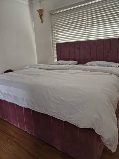 king size iron bed with soft padding and side tables NO MATTRESS