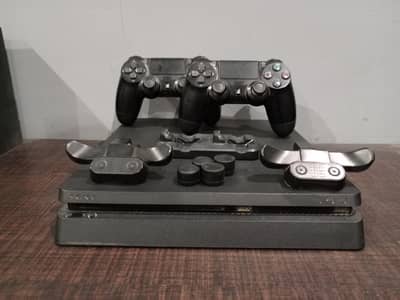 PS4 Slim 1TB + 2 Controllers + 2 Games (Good Condition)