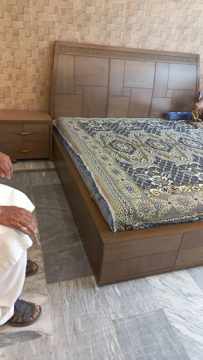 bed with side tables and dressing