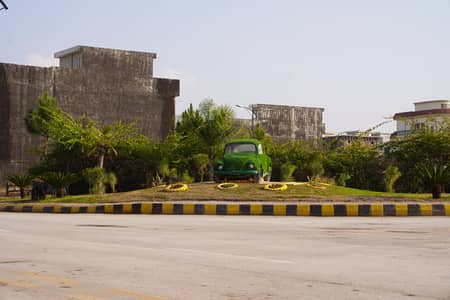 Plot for sale in Sector B Main Boulevard Possession Utility Paid Near to Gate Reasonable Price Best Location For living Bahria Enclave Islamabad