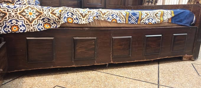 Double bed with a dressing table in used condition