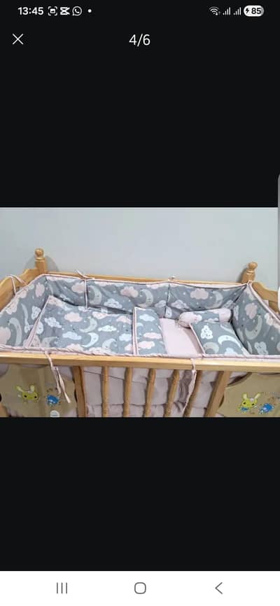 Baby cot with mattress, bedding, mosquito net and swing