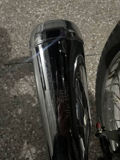 Honda 125 silencer KYH Atlas Honda in cheap rate