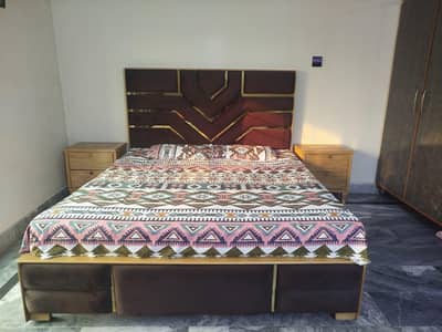 King size bed with side tables and dressing