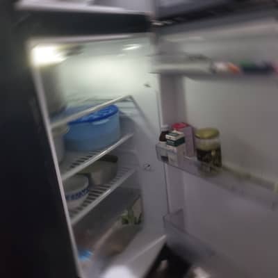 Dawlance 9170 WB GD Inverter Refrigerator is a 320-liter (