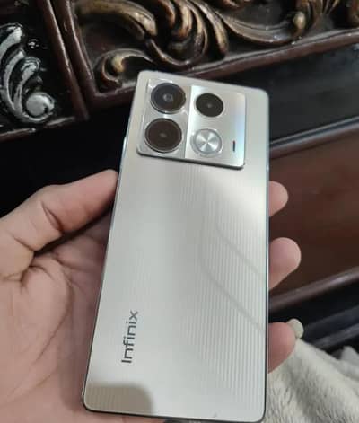 Infinix note 40 14 month used single hand used all ok with box