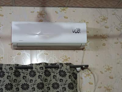 1.0 Ton heat and cool DC inverter split air conditioner.