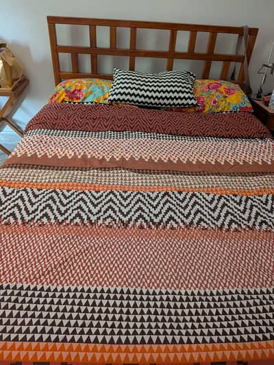 Pine wood bed Ikea design with bedside table