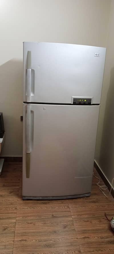 Full Size Fridge with Small Freezer