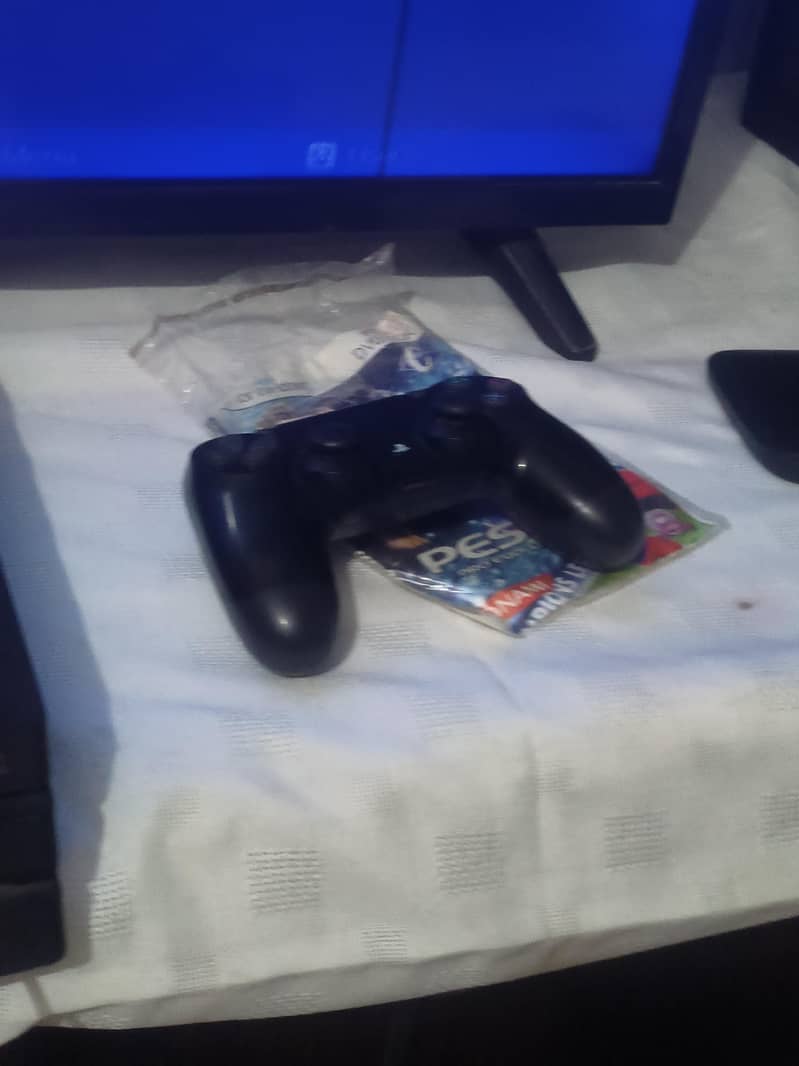 PS4 pro with two controllers 3