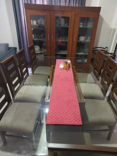Dinning table and wooden almirah